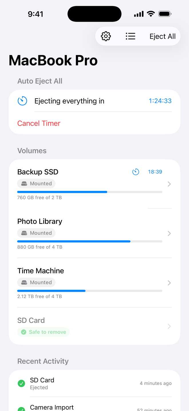 Ejectify for iPhone showing a MacBook Pro's drives with a running auto-eject timer